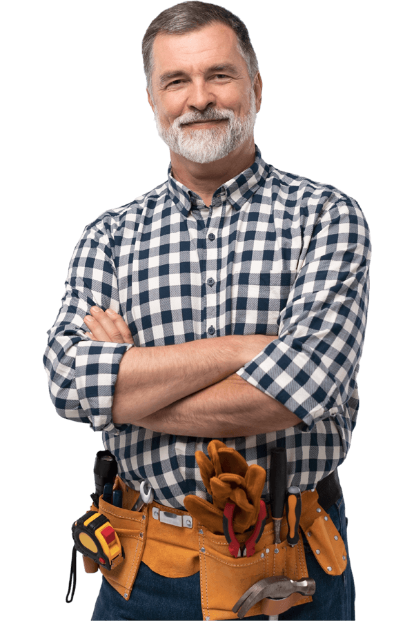 A smiling man holding various tools, showcasing his readiness for a DIY project or repair work.